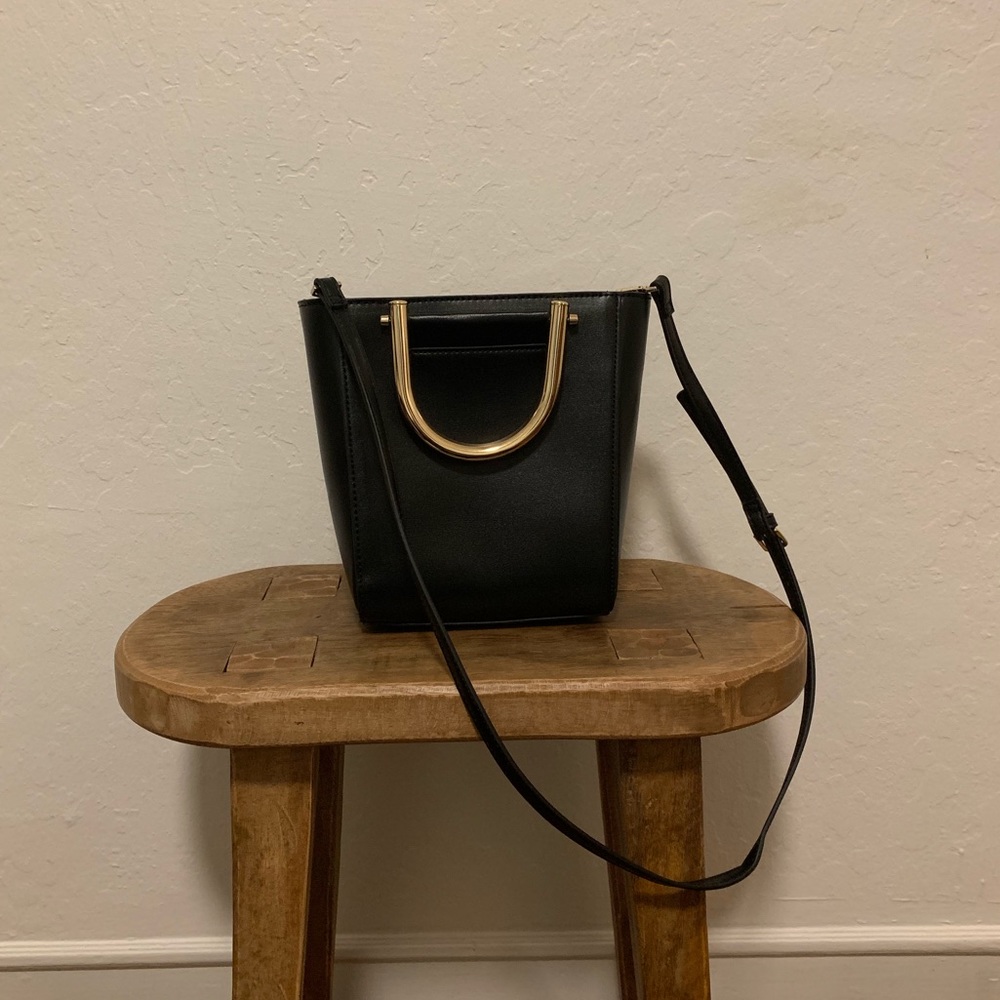 Black bucket purse with gold detail